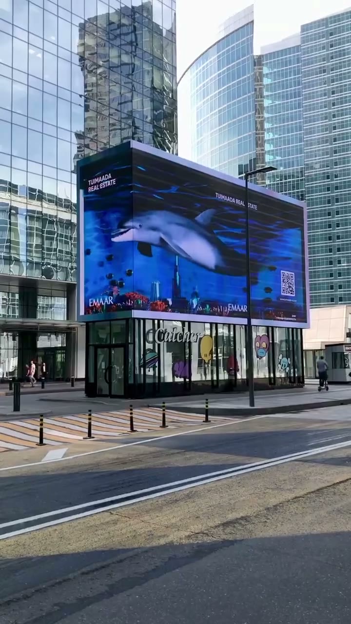 Дельфин в подводном Дубае на 3D Naked-Eye медиафасаде Москва-Сити